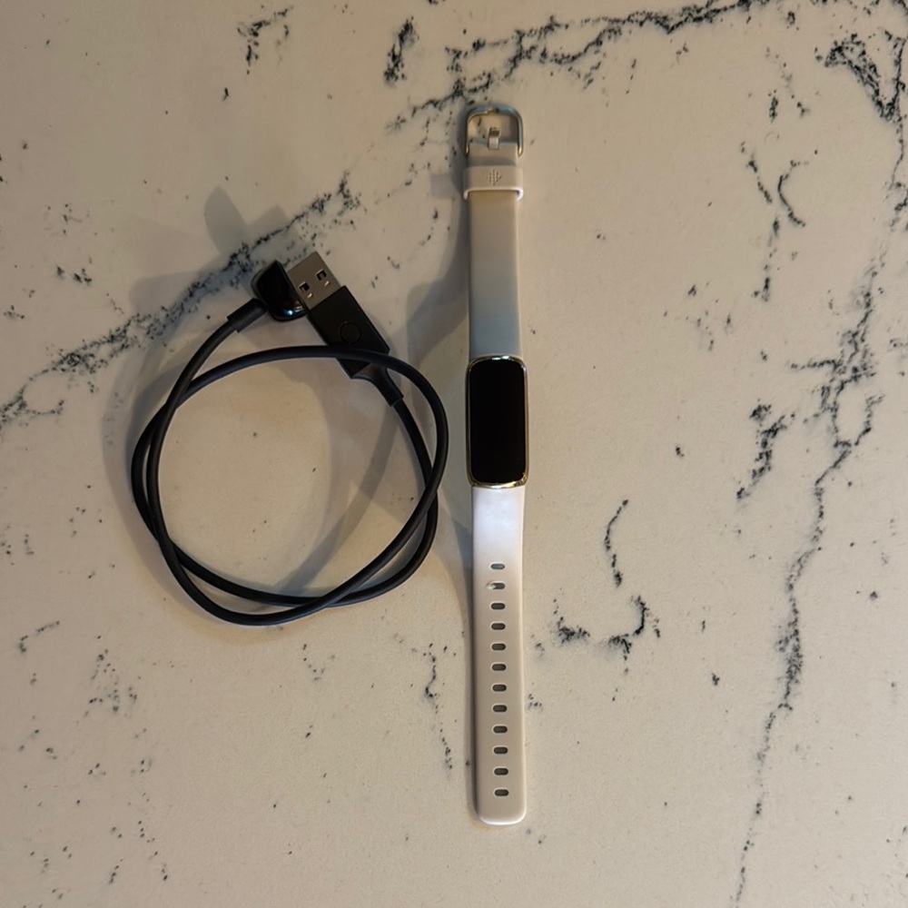 Fitbit Luxe 
Like new only worn a couple times.
